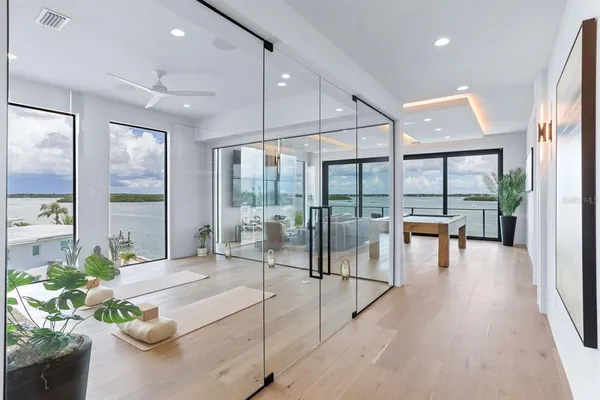 a spacious bedroom with a bed and a table