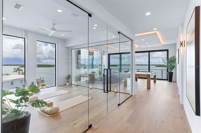 a spacious bedroom with a bed and a table