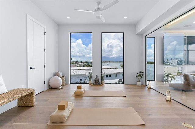 a view of a balcony with furniture