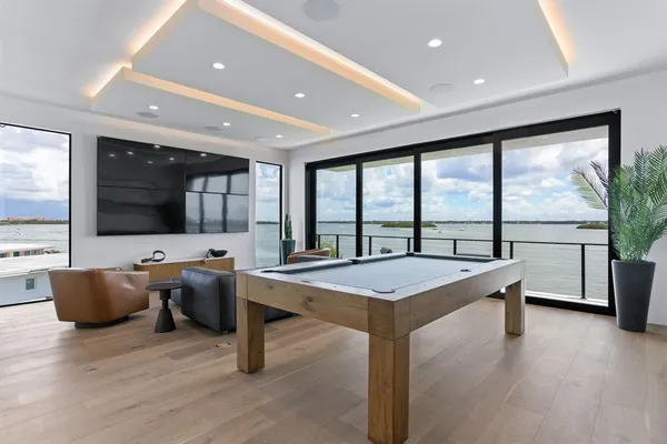 a view of a balcony with furniture