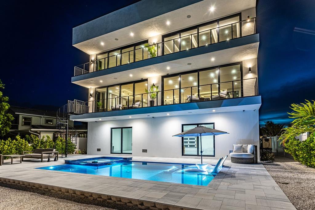 445 129th Avenue East Madeira Beach, FL 33708 - Photo 49 of 72 a front view of building with an entrance