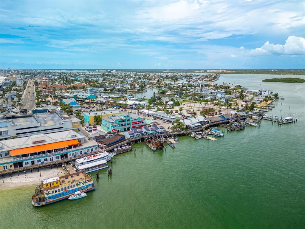 445 129th Avenue East Madeira Beach, FL 33708 - Photo 59 of 72 an aerial view of a houses with swimming pool and outdoor space