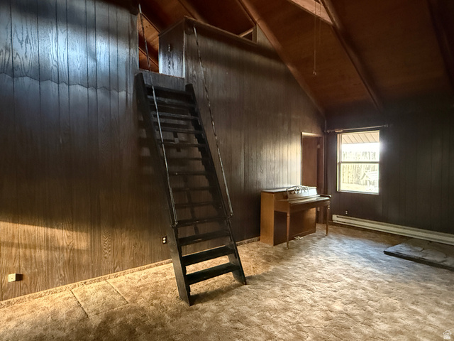 4709 East Independence Road Myton, UT 84052 - Photo 18 of 25 Vaulted wood-finish ceilings and walls with a fixed wooden ladder accessing an upper loft