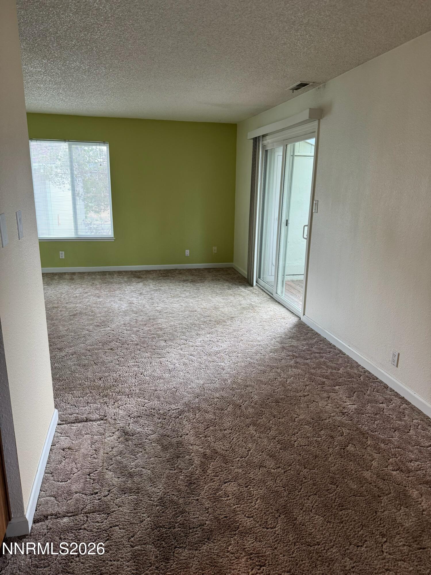 400 South Saliman Road, Unit 14 Carson City, NV 89701 - Photo 22 of 35 an empty room with windows