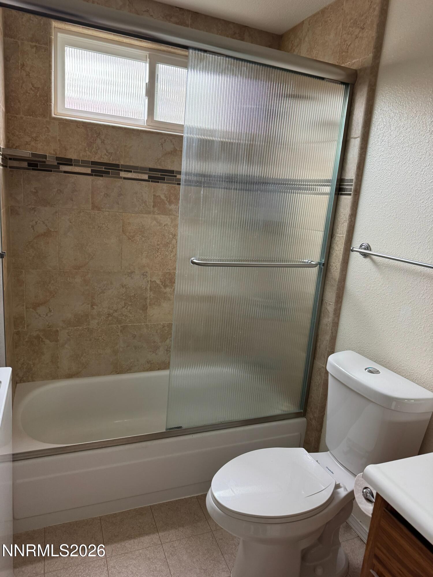 400 South Saliman Road, Unit 14 Carson City, NV 89701 - Photo 24 of 35 a white toilet sitting next to a bath tub
