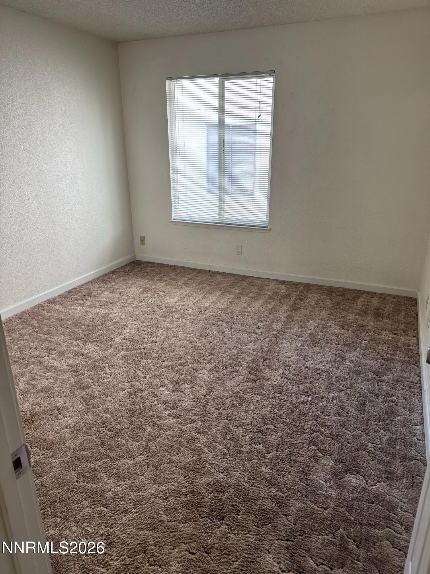 400 South Saliman Road, Unit 14 Carson City, NV 89701 - Photo 29 of 35 an empty room with a window