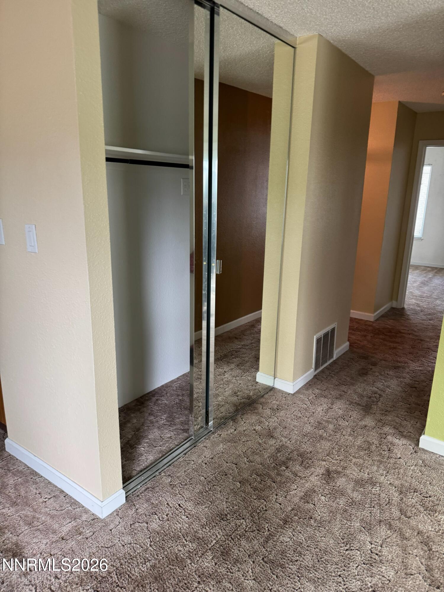400 South Saliman Road, Unit 14 Carson City, NV 89701 - Photo 32 of 35 an empty room with windows