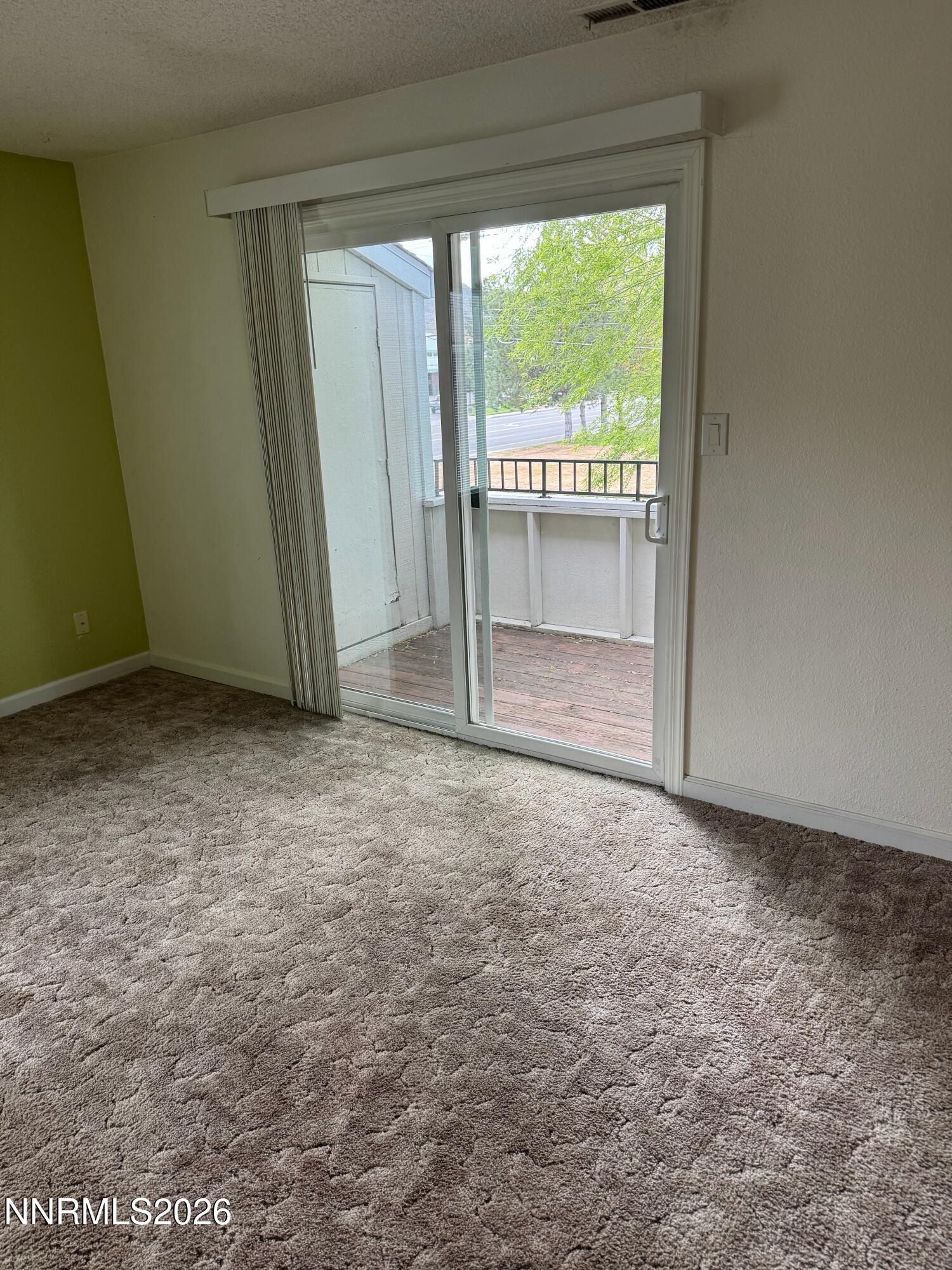 400 South Saliman Road, Unit 14 Carson City, NV 89701 - Photo 33 of 35 a view of an empty room and window