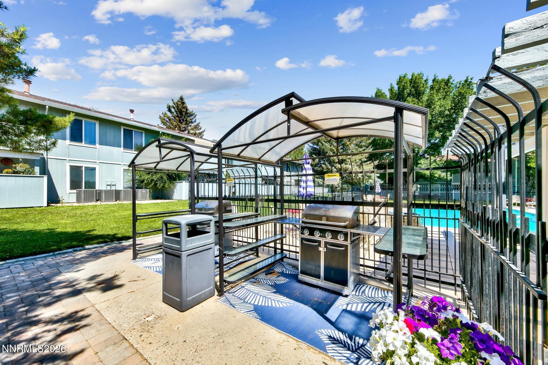 400 South Saliman Road, Unit 14 Carson City, NV 89701 - Photo 7 of 35 a view of a chairs and tables in the patio