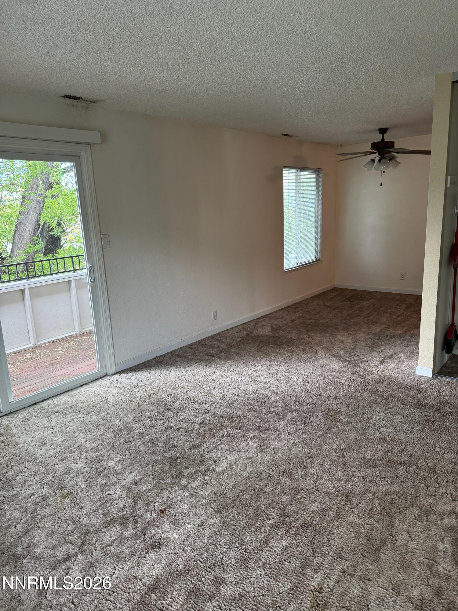 400 South Saliman Road, Unit 14 Carson City, NV 89701 - Photo 9 of 35 an empty room with a empty space and windows