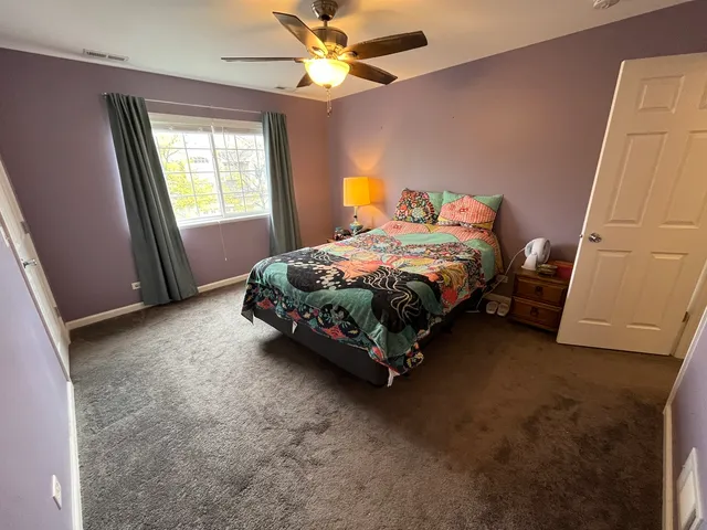 a bathroom with a sink toilet and mirror
