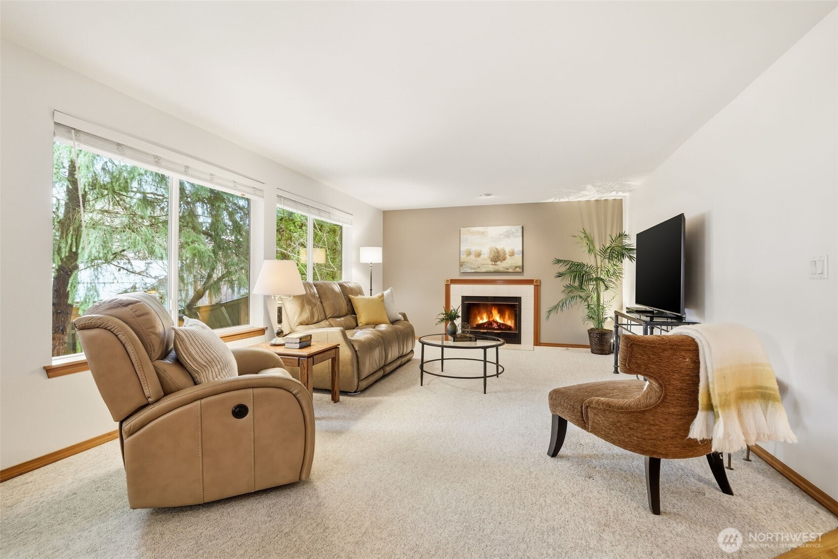 32413 7th Avenue Southwest Federal Way, WA 98023 - Photo 16 of 39 a living room with furniture a fireplace and a flat screen tv