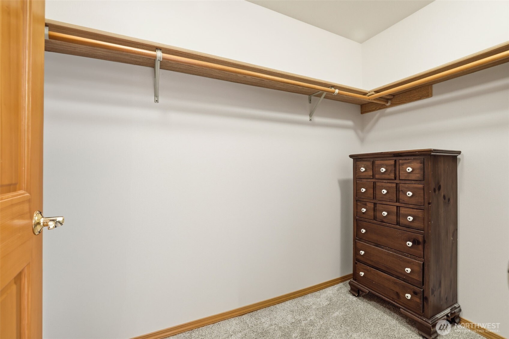 32413 7th Avenue Southwest Federal Way, WA 98023 - Photo 22 of 39 a view of walk in closet with empty racks
