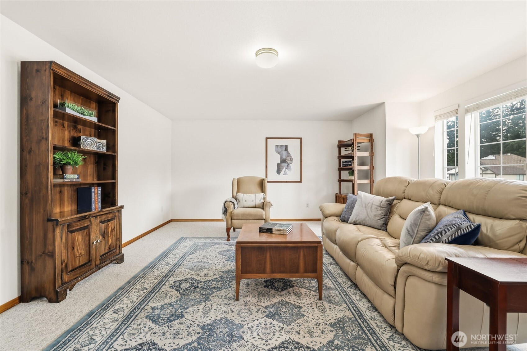 32413 7th Avenue Southwest Federal Way, WA 98023 - Photo 28 of 39 a living room with furniture a rug and a window