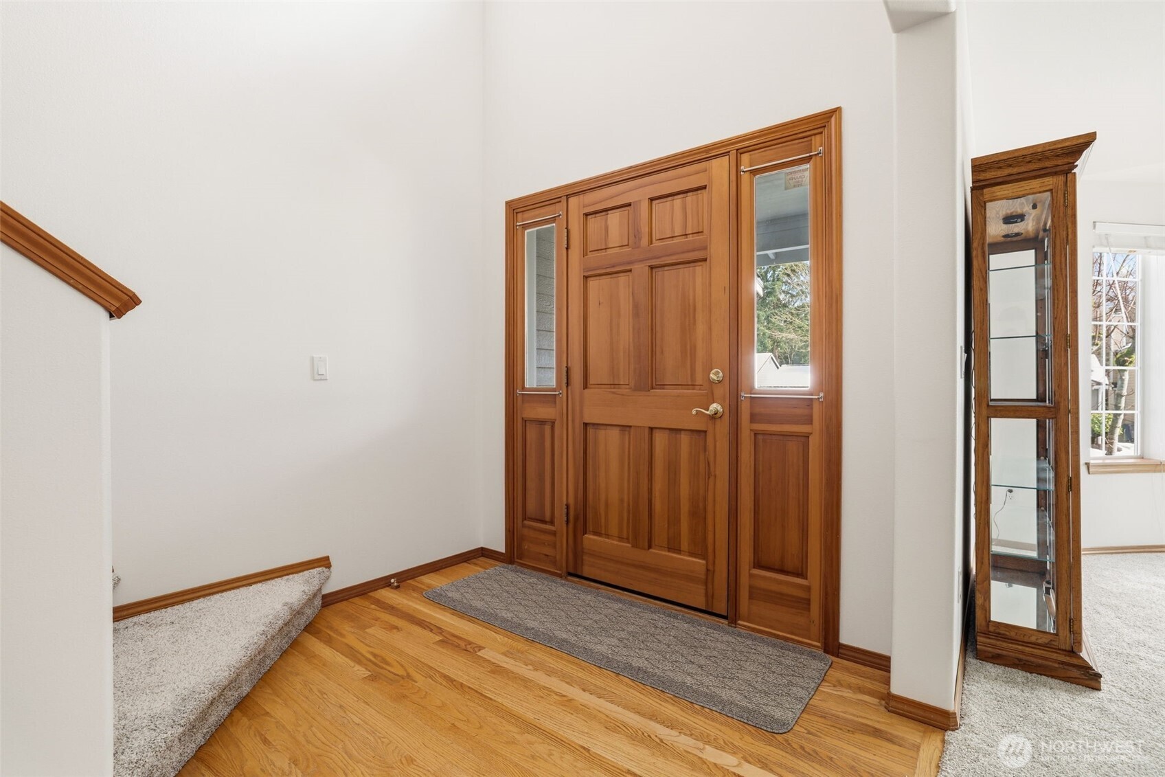 32413 7th Avenue Southwest Federal Way, WA 98023 - Photo 6 of 39 a view of a hallway with wooden floor and entryway
