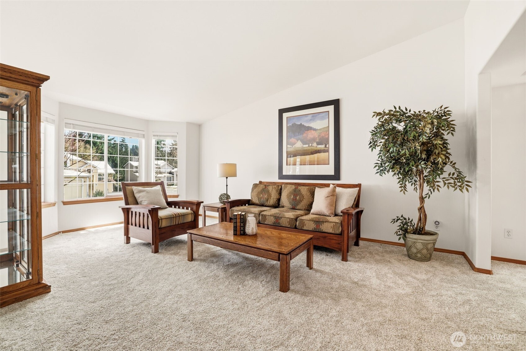 32413 7th Avenue Southwest Federal Way, WA 98023 - Photo 7 of 39 a living room with furniture and a potted plant