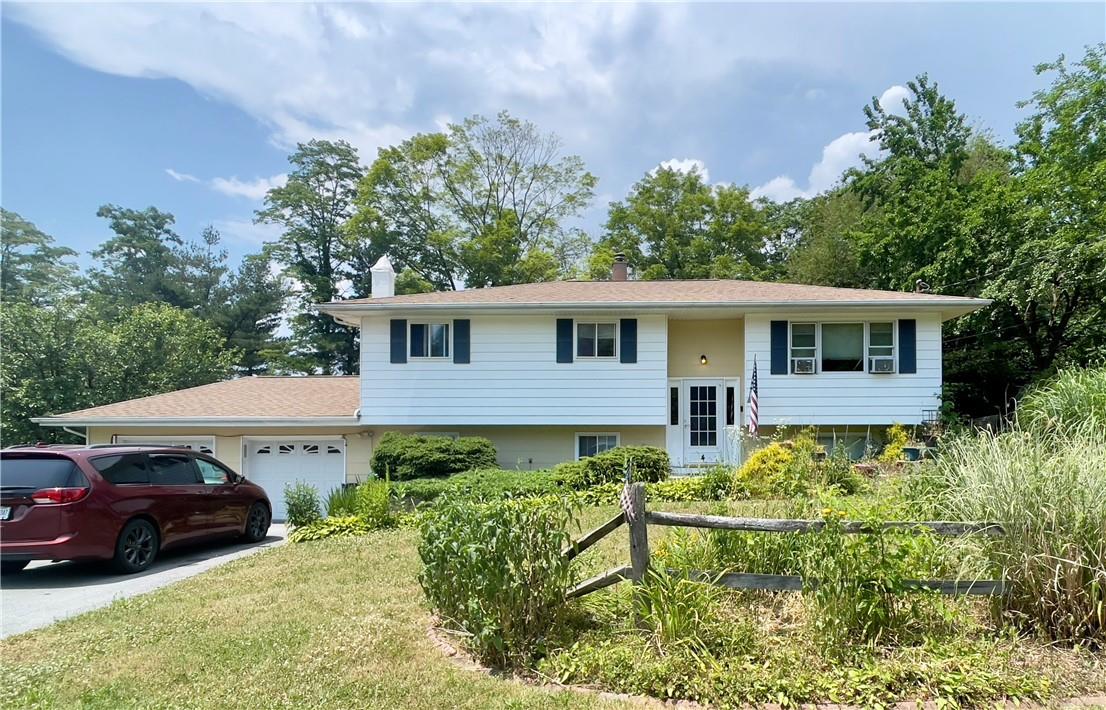 4 Wagon Wheel Road Poughkeepsie, NY 12601 - Photo 1 of 1 front view of house with a yard