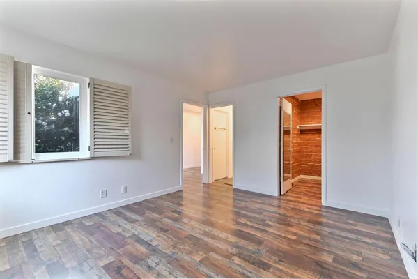 a view of an empty room and window