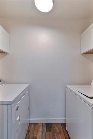 a utility room with dryer and washer