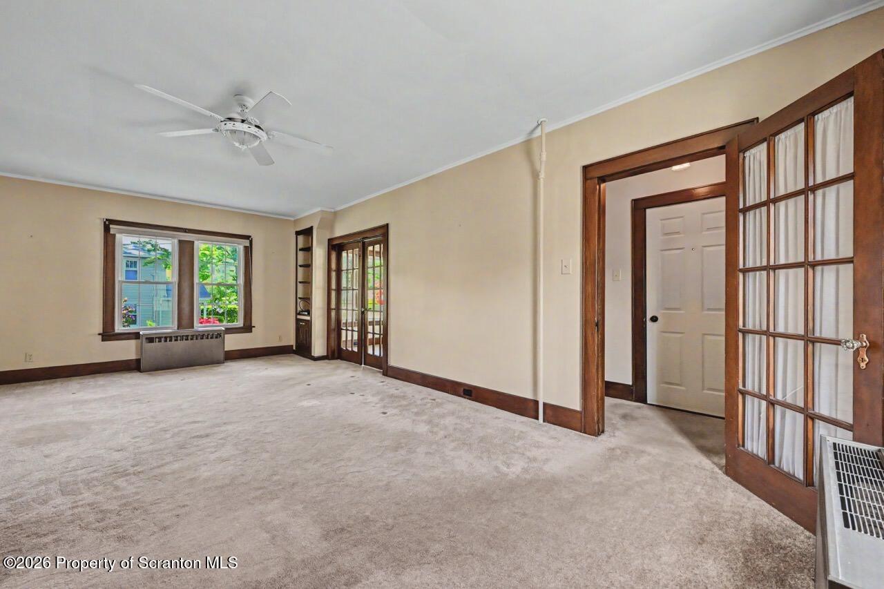 502 Layton Road Clarks Summit, PA 18411 - Photo 9 of 42 a view of an empty room with a window