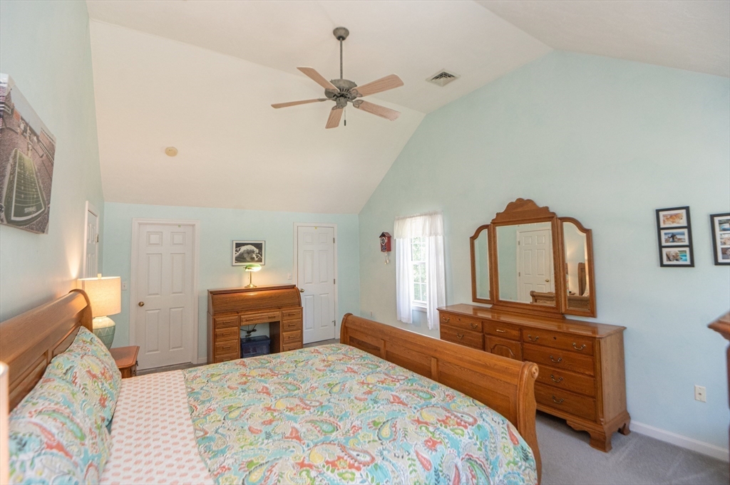 3 Maria Drive Ipswich, MA 01938 - Photo 27 of 36 a bedroom with a bed and a dresser