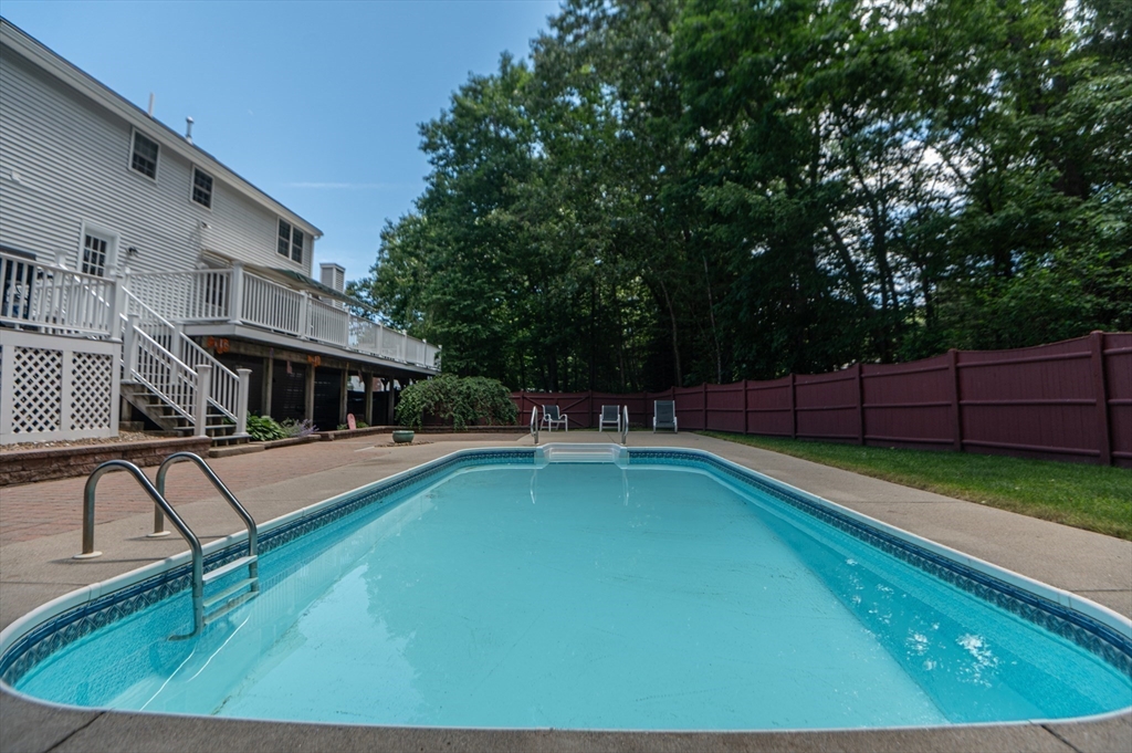 3 Maria Drive Ipswich, MA 01938 - Photo 35 of 36 a view of a swimming pool with a patio