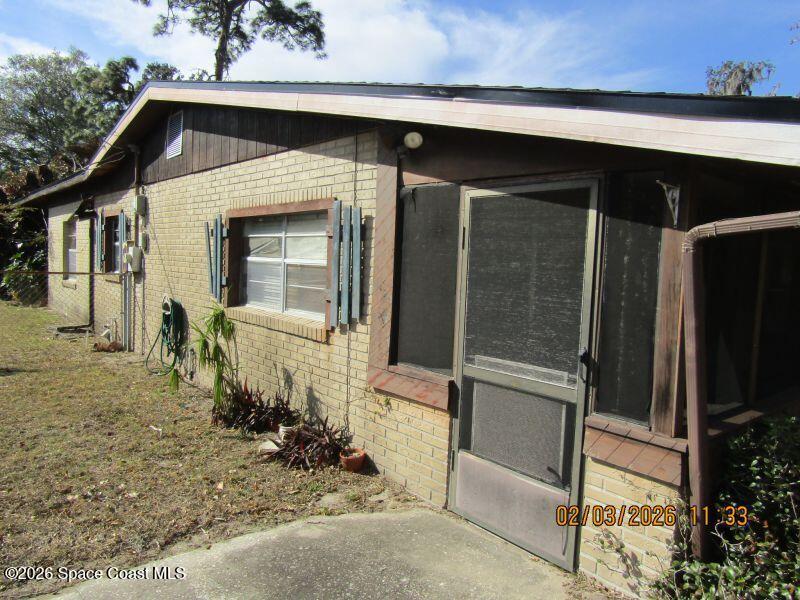 2511 Grove Street Titusville, FL 32796 - Photo 3 of 18 1945520_elevleft
