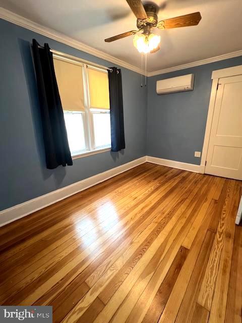 551 Washington Avenue Ewing, NJ 08628 - Photo 22 of 35 a view of an empty room with wooden floor and a window