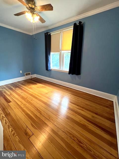 551 Washington Avenue Ewing, NJ 08628 - Photo 23 of 35 a view of empty room with window and ceiling fan