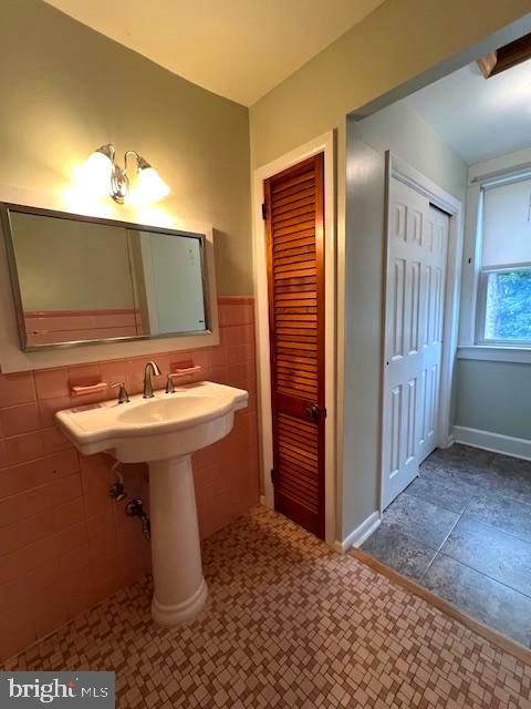 551 Washington Avenue Ewing, NJ 08628 - Photo 25 of 35 a bathroom with a sink a mirror and shower