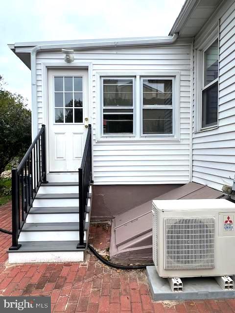 551 Washington Avenue Ewing, NJ 08628 - Photo 30 of 35 a view of a house with more windows and brick walls
