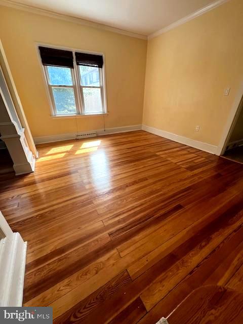 551 Washington Avenue Ewing, NJ 08628 - Photo 9 of 35 a view of an empty room with wooden floor and a window