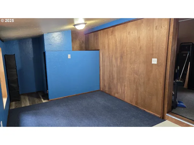 a open space with a sink and a mirror