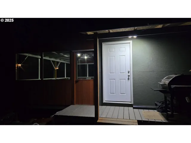 a black and white photo of a house