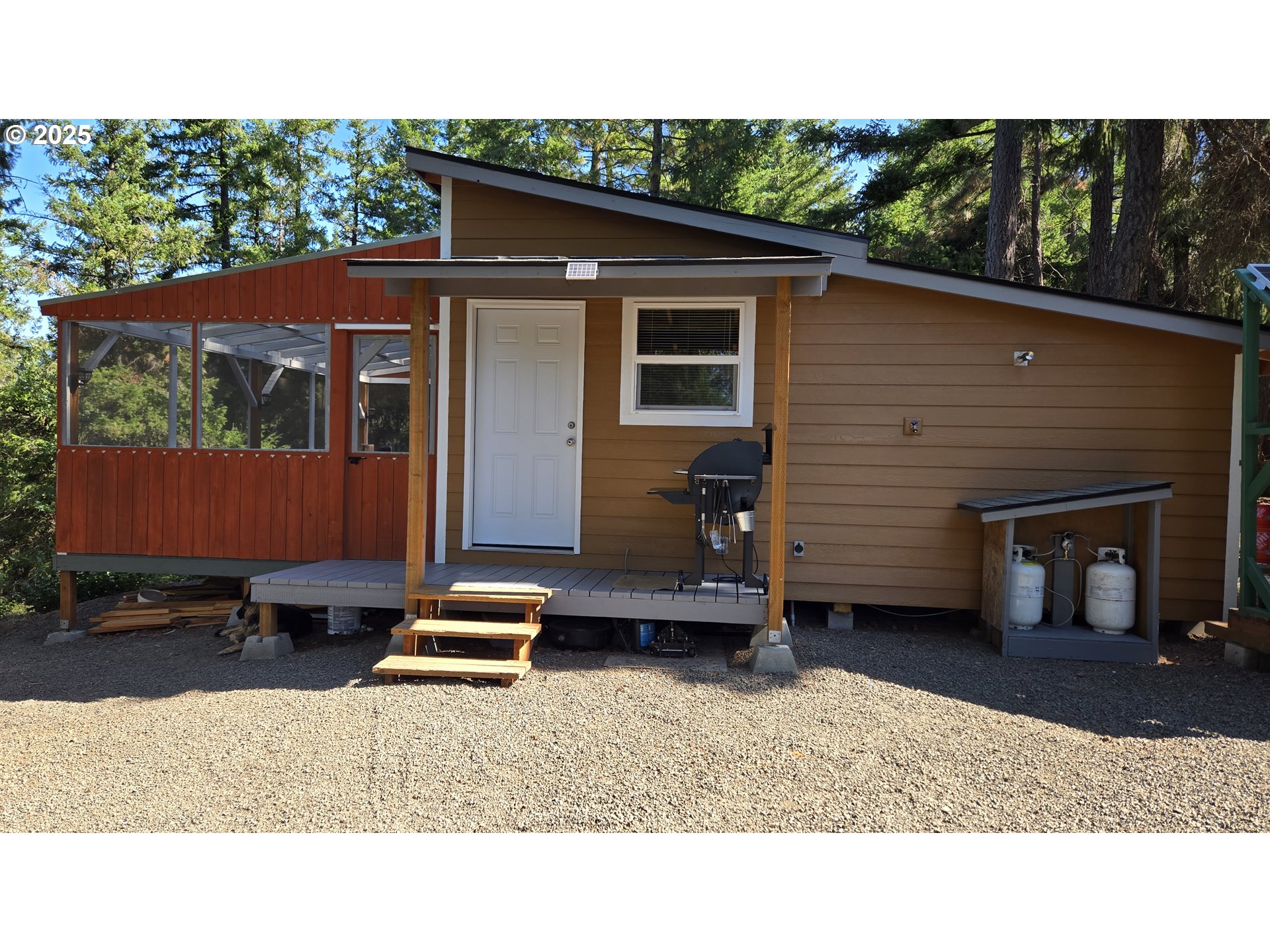 Pine Ridge, Unit 54 Goldendale, WA 98620 - Photo 3 of 43 a backyard of a house with barbeque oven