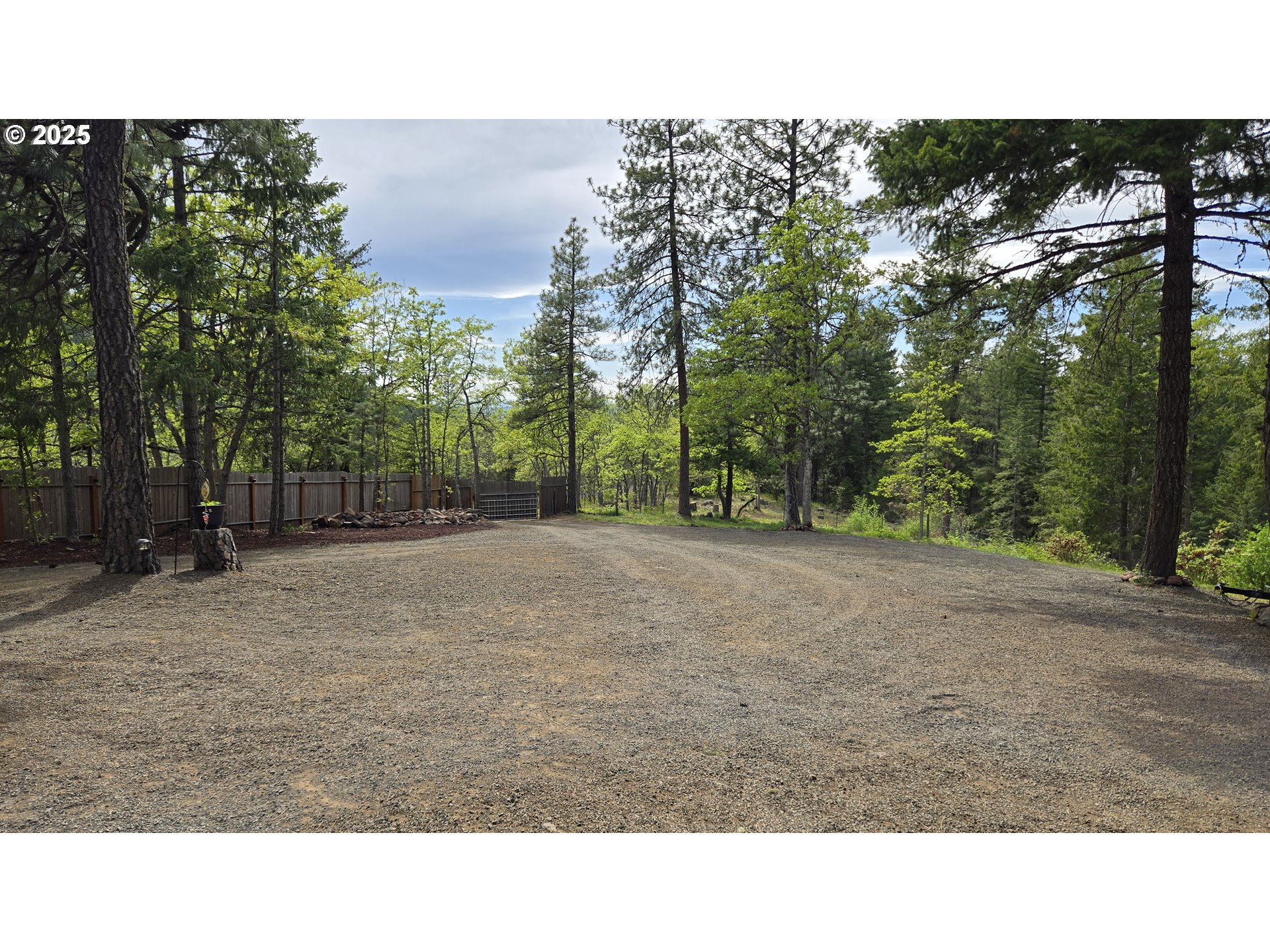 Pine Ridge, Unit 54 Goldendale, WA 98620 - Photo 33 of 43 a open area with trees in the background