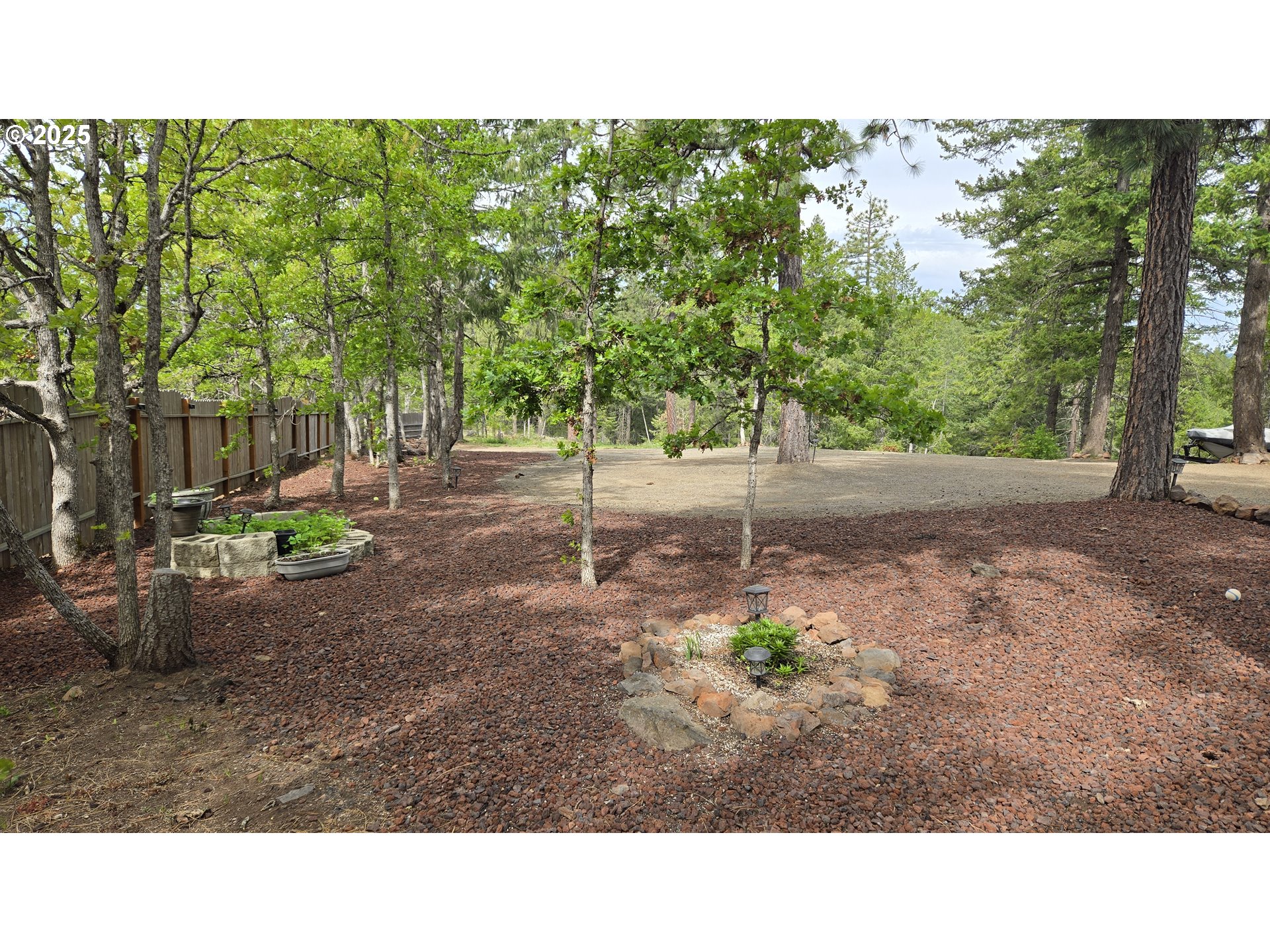 Pine Ridge, Unit 54 Goldendale, WA 98620 - Photo 36 of 43 a open area with trees in the background