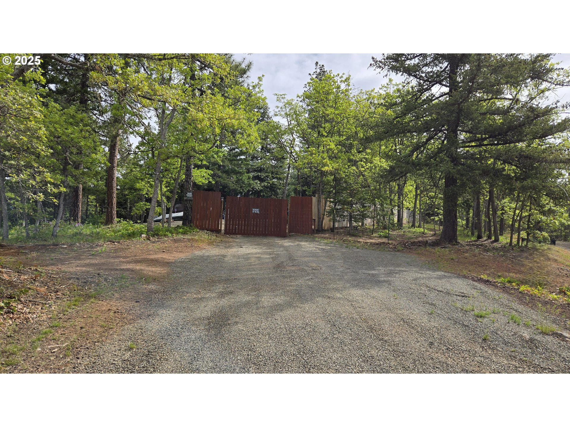 Pine Ridge, Unit 54 Goldendale, WA 98620 - Photo 39 of 43 a open area with trees in the background