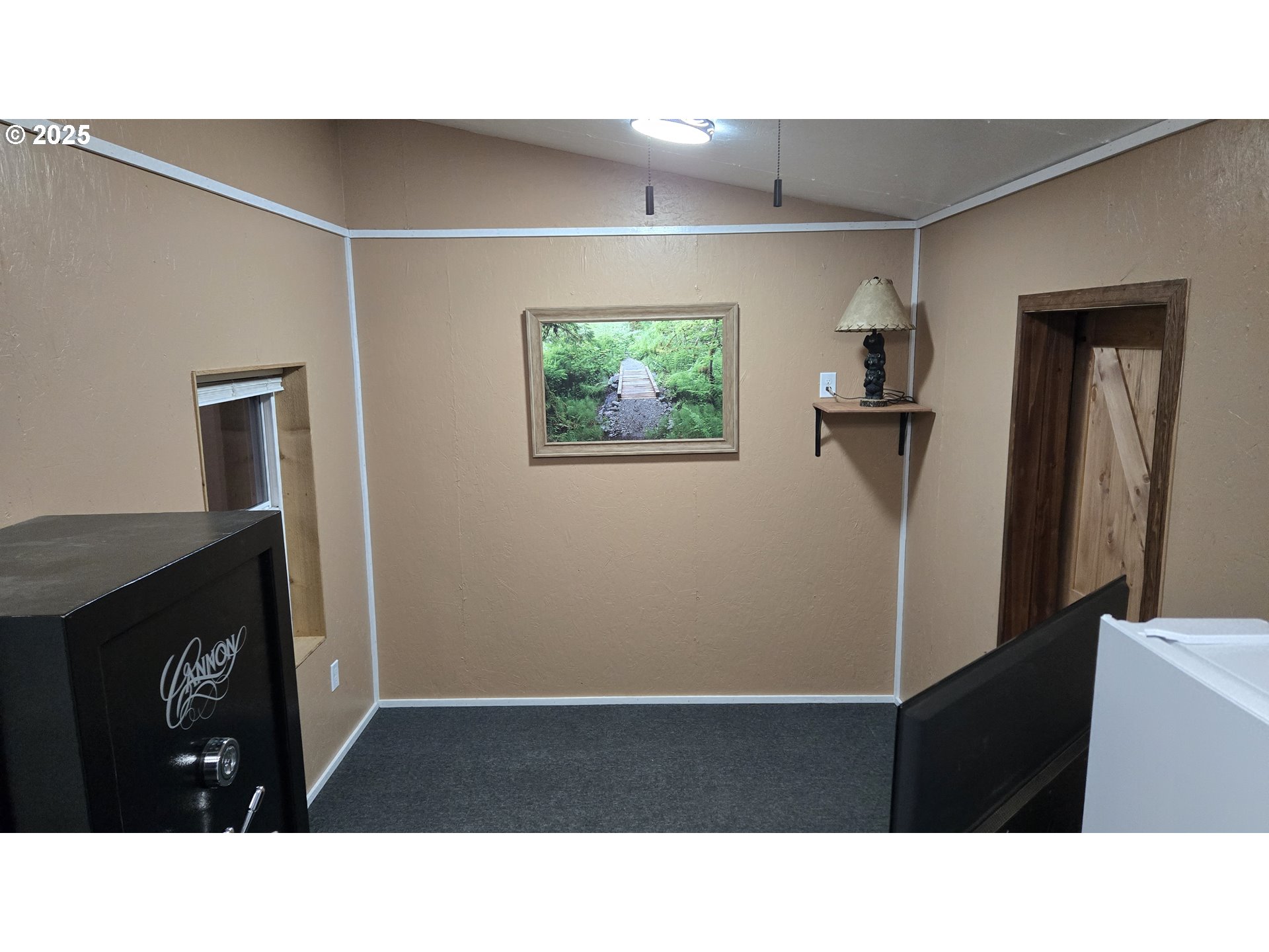 Pine Ridge, Unit 54 Goldendale, WA 98620 - Photo 7 of 43 a open kitchen with a sink and a refrigerator