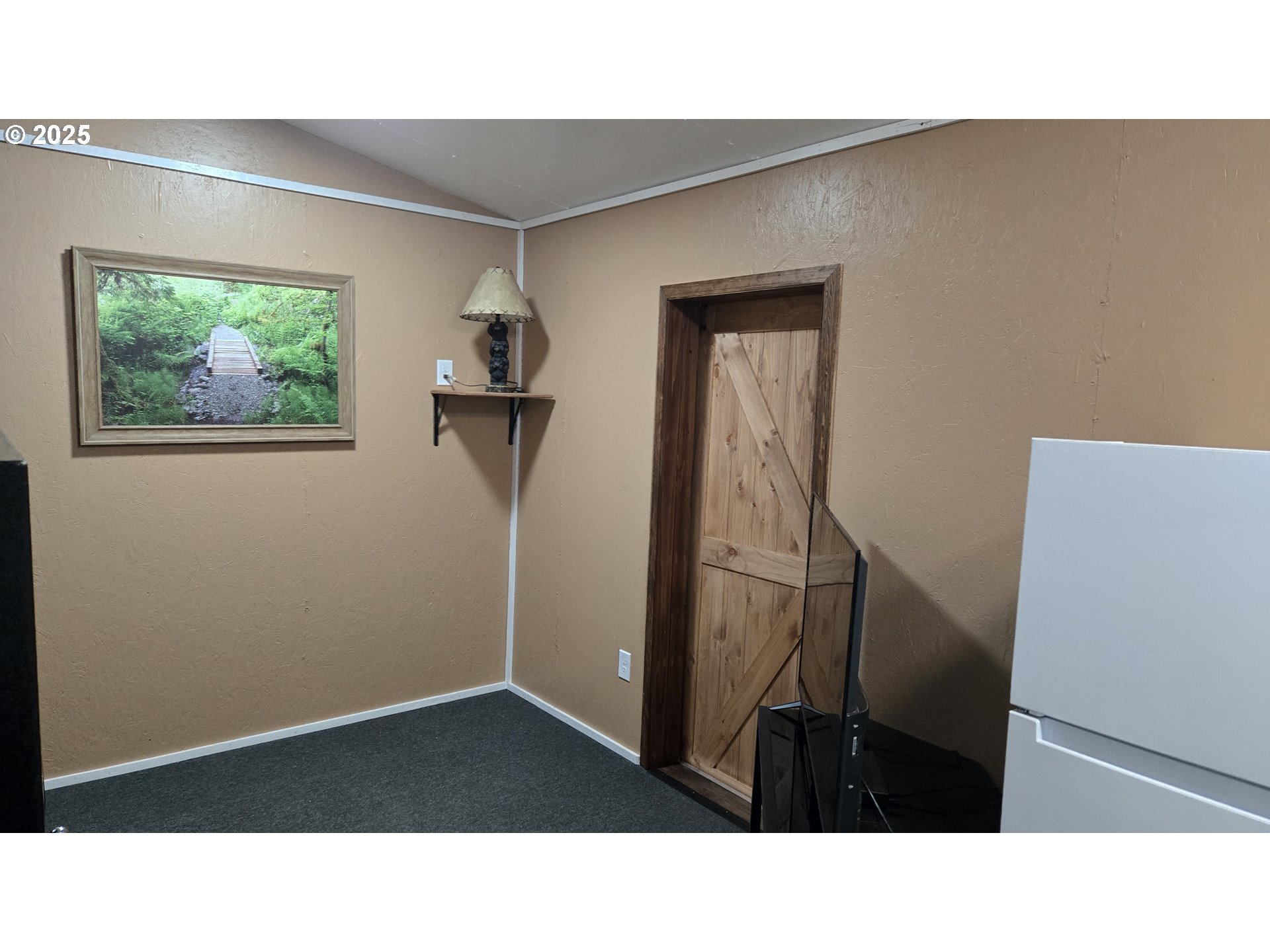 Pine Ridge, Unit 54 Goldendale, WA 98620 - Photo 8 of 43 a black and white photo of a house