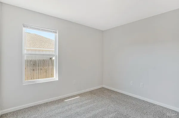 a view of a swimming pool with an ocean view