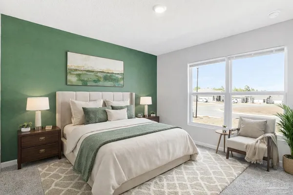 a dining room with stainless steel appliances granite countertop a stove a table and chairs