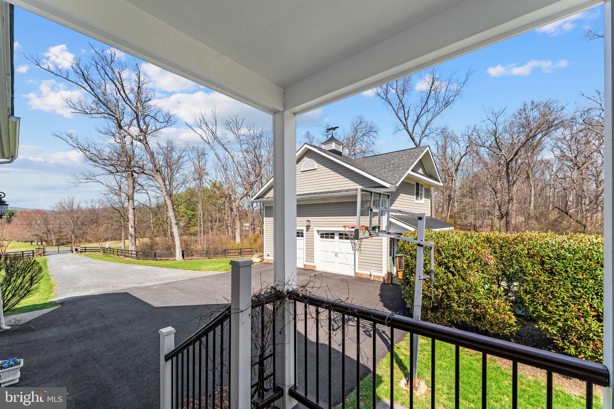18940 Airmont Road Purcellville, VA 20132 - Photo 61 of 91 Side Porch with Access to Arrival Center & Laundry