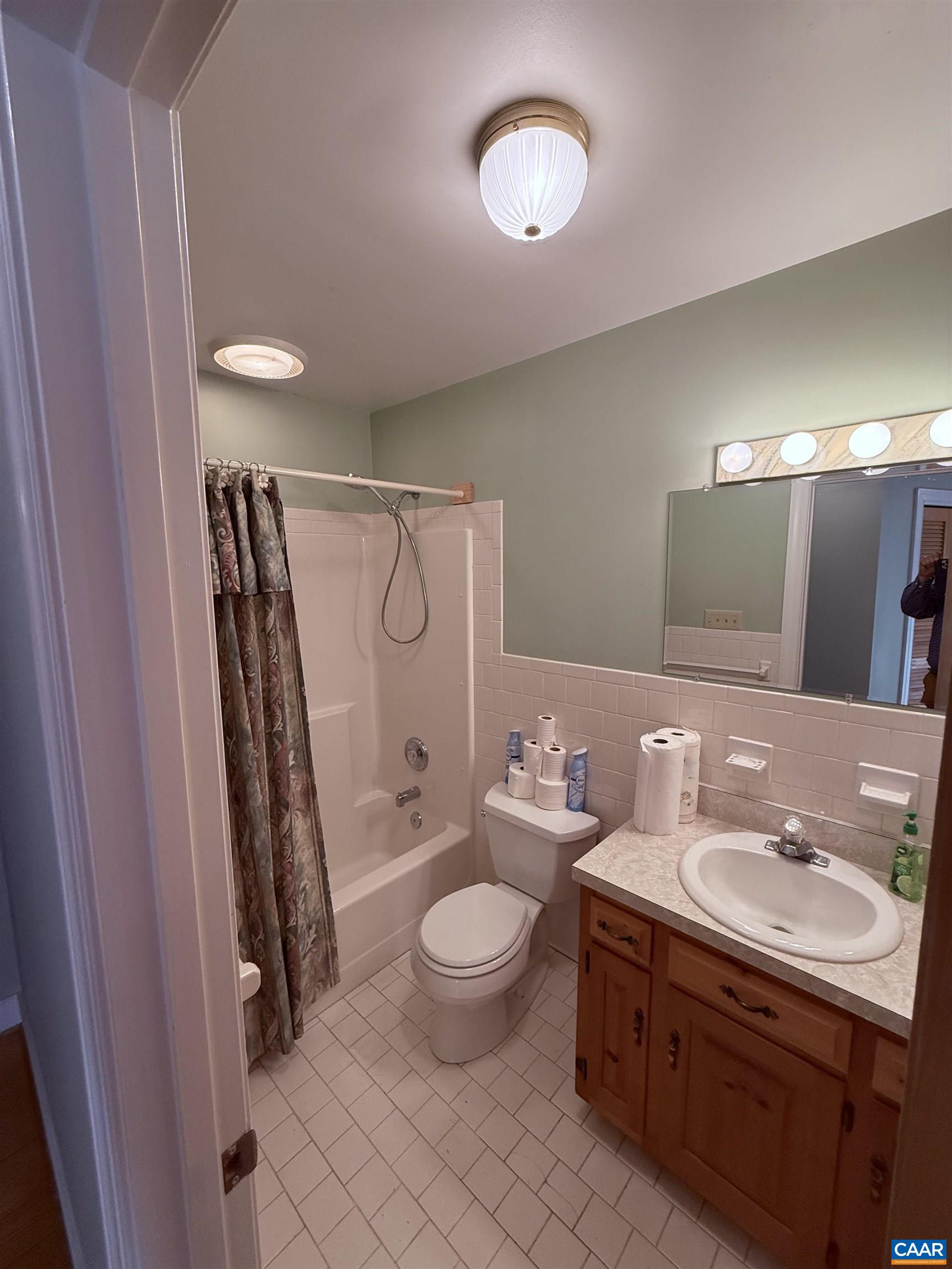 5051 Shannon Hill Road Kents Store, VA 23084 - Photo 43 of 67 a bathroom with a toilet sink and mirror