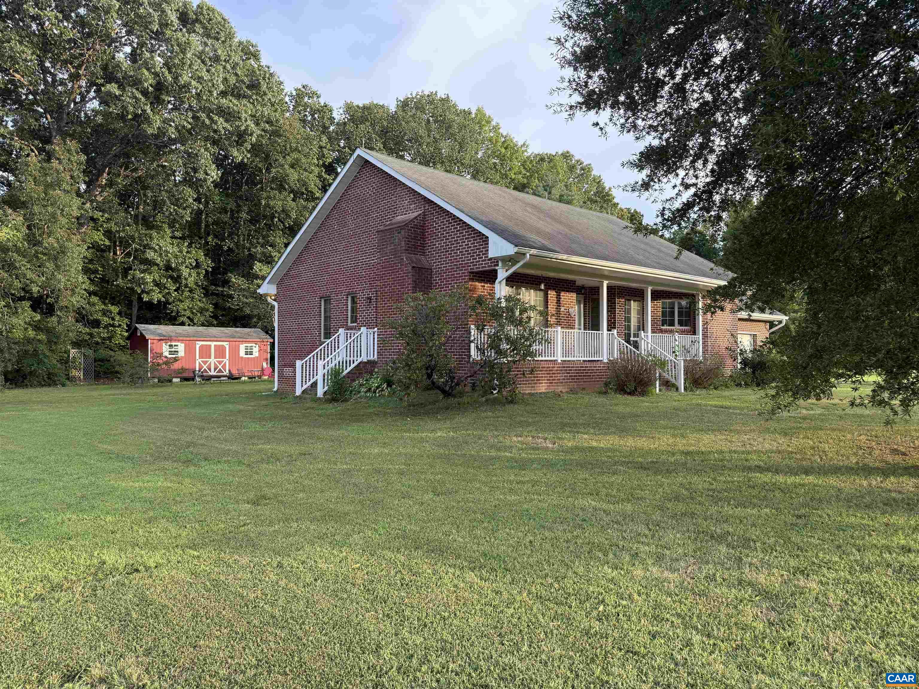 5051 Shannon Hill Road Kents Store, VA 23084 - Photo 54 of 67 a front view of house with yard and green space