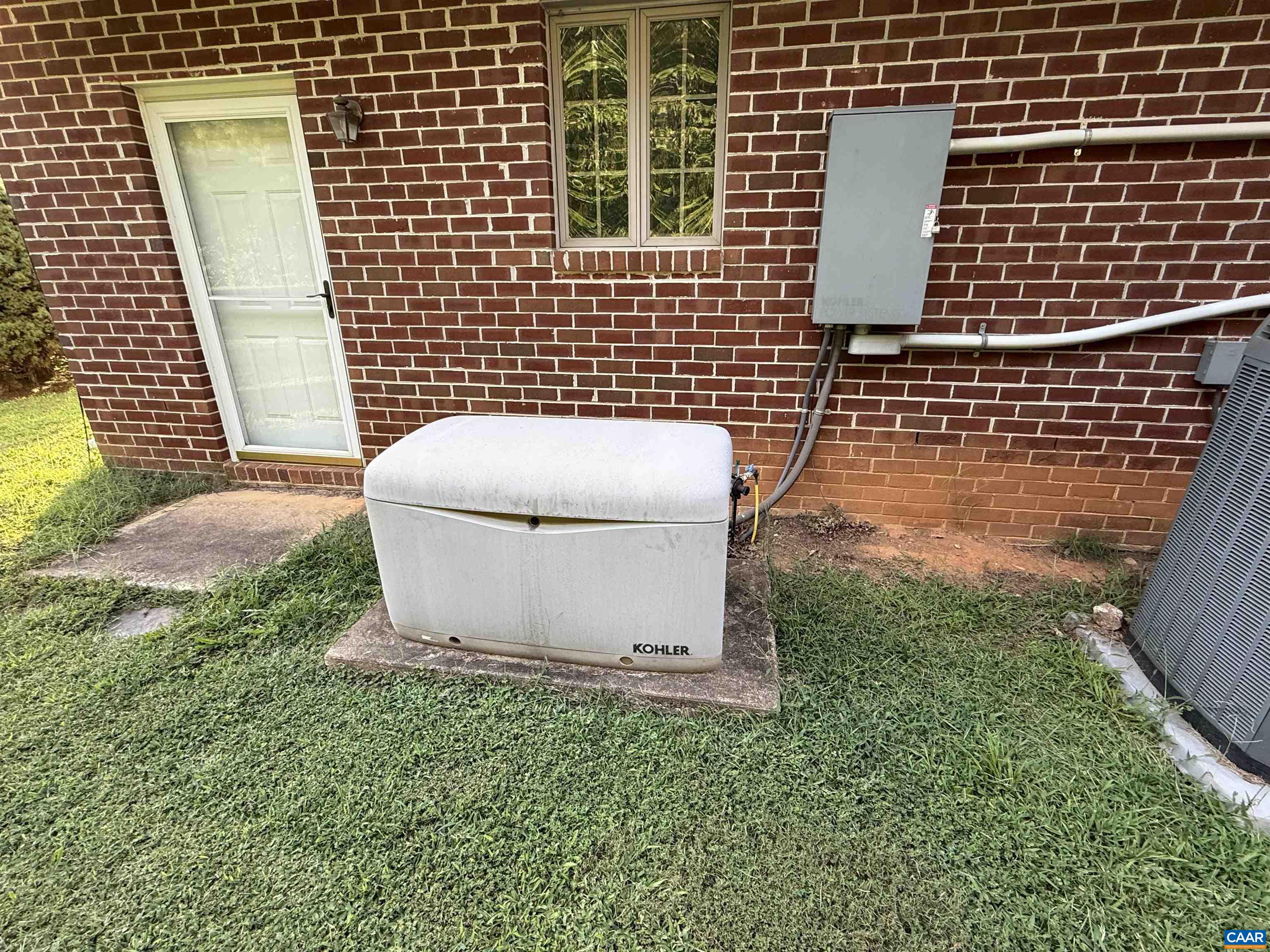5051 Shannon Hill Road Kents Store, VA 23084 - Photo 62 of 67 a view of a brick wall and floor to ceiling window