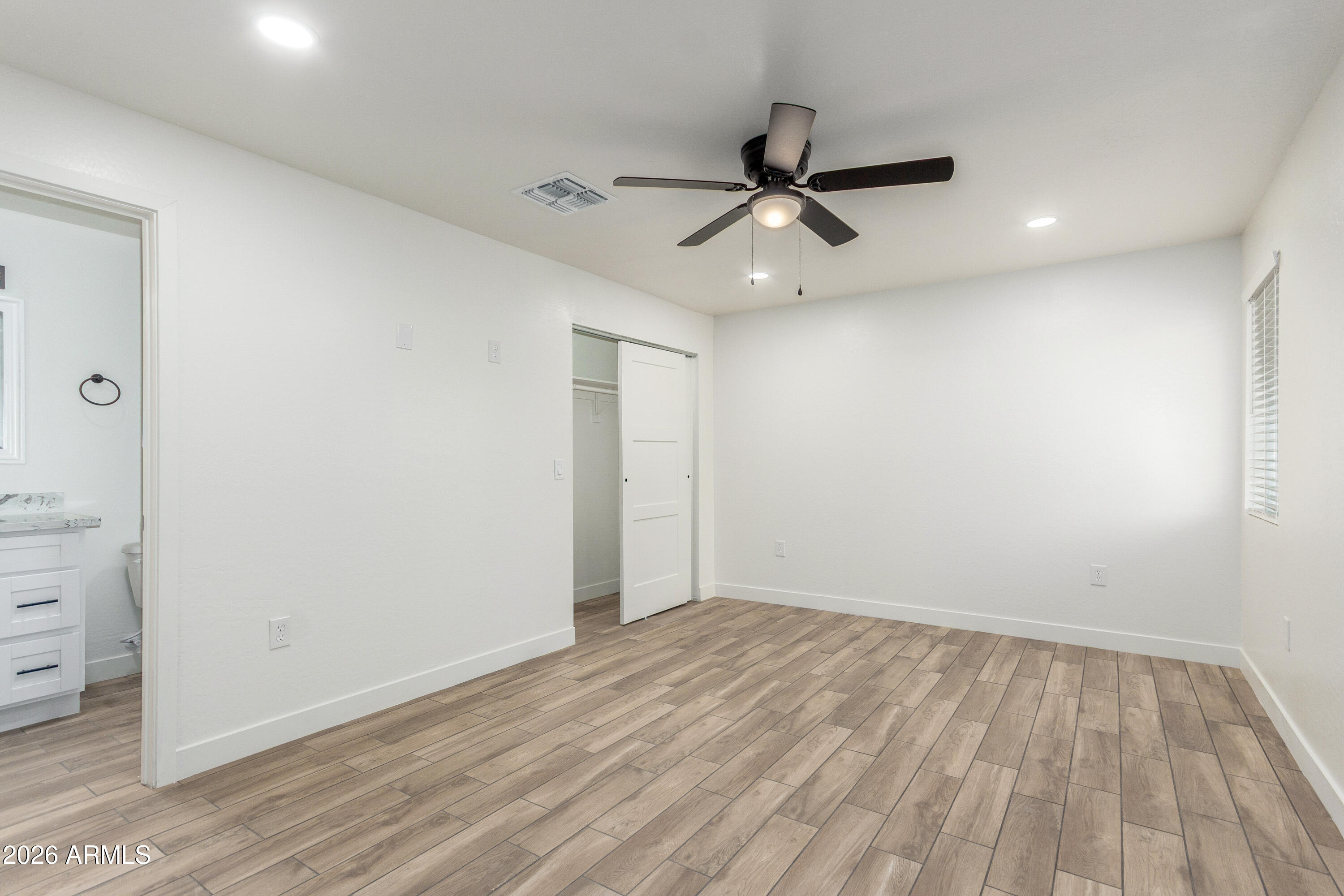 16632 North 18th Place Phoenix, AZ 85022 - Photo 20 of 28 wooden floor in an empty room