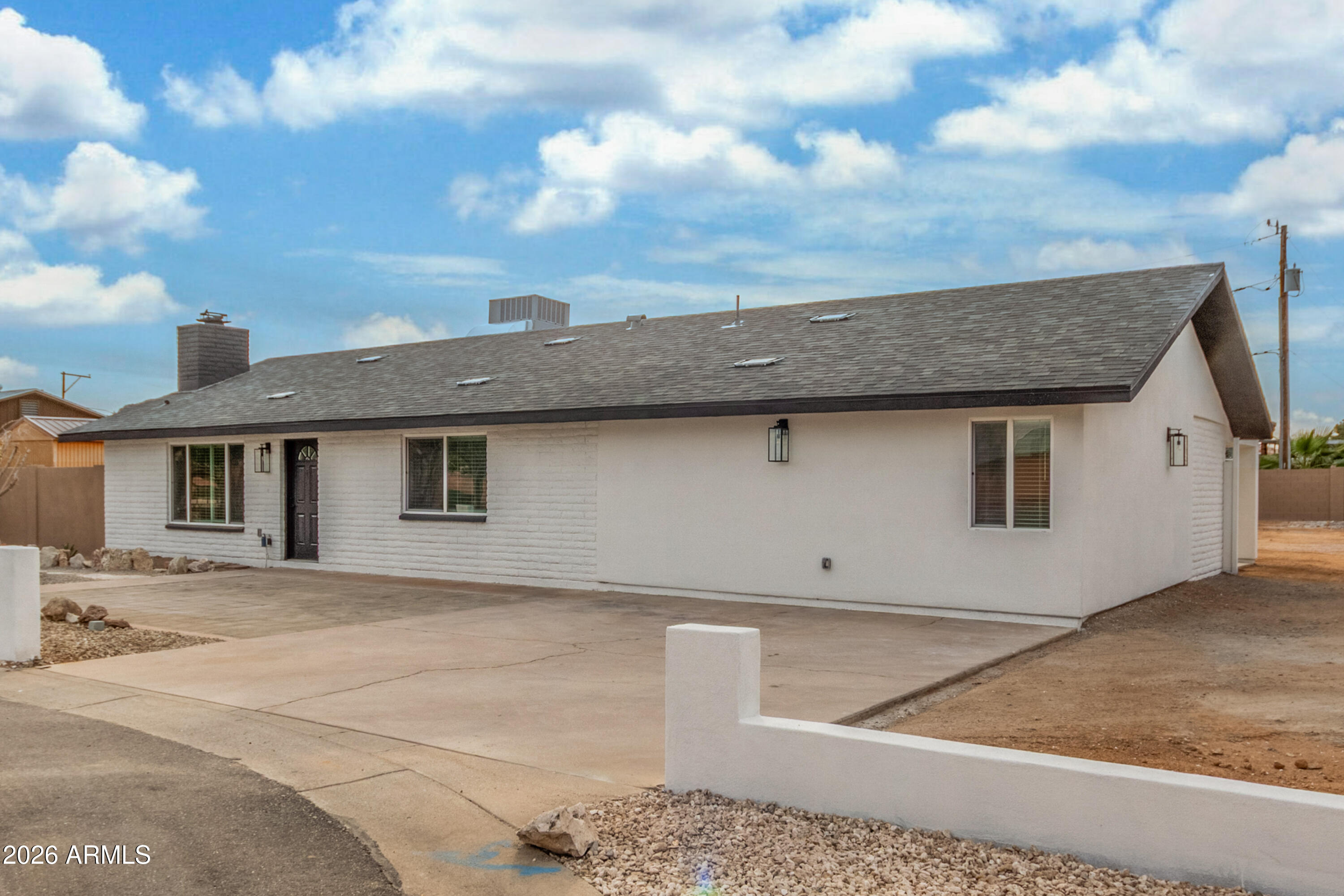 16632 North 18th Place Phoenix, AZ 85022 - Photo 6 of 28 a front view of a house with a garage
