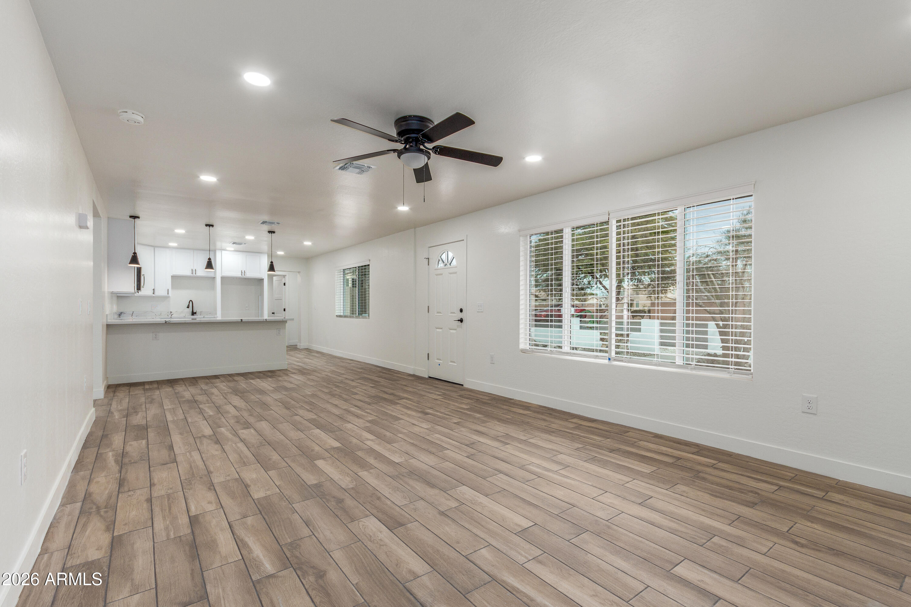 16632 North 18th Place Phoenix, AZ 85022 - Photo 10 of 28 a view of an empty room with a window