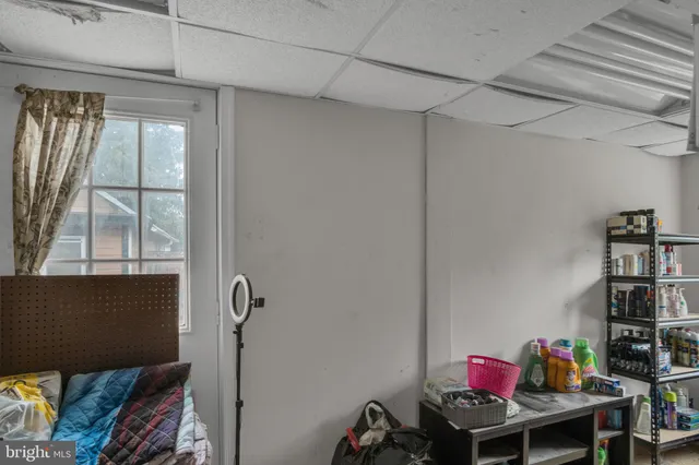 a view of a workspace with furniture